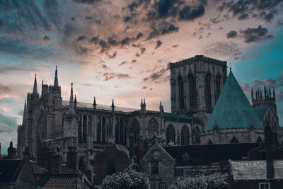 Panoramic view of buildings against sky during sunset