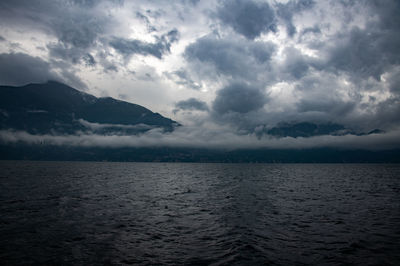 Scenic view of sea against cloudy sky