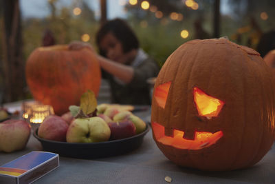 Carved pumpkin on table