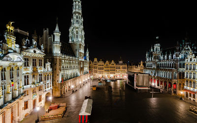 Illuminated buildings in city at night