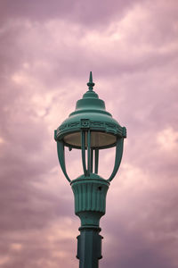 Low angle view of street light against sky