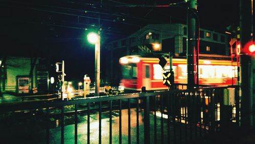 Illuminated street light at night