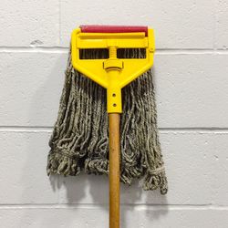 Mop against wall
