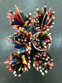 High angle view of multi colored pencils on table