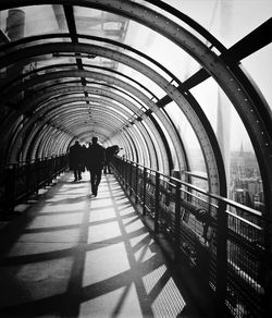 People walking in tunnel