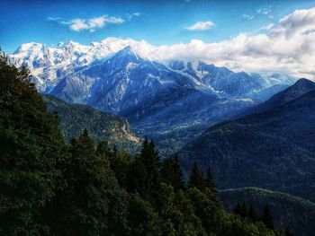 Scenic view of snowcapped mountains against sky