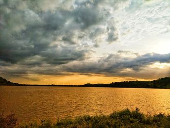 Scenic view of sunset over lake