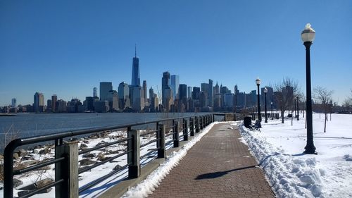 View of buildings in city during winter