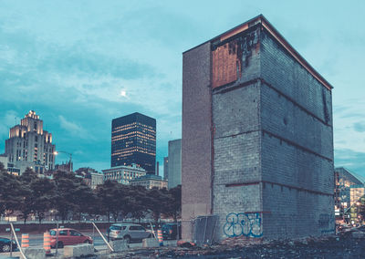 Low angle view of modern buildings against sky