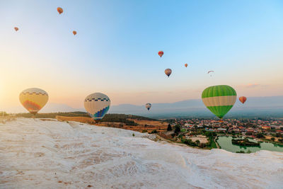 Hot air balloons flying in sky