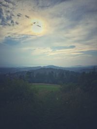 Scenic view of landscape against sky during sunset