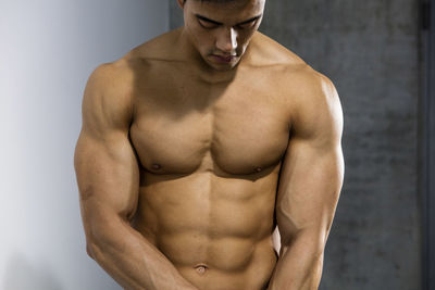 Close-up of shirtless muscular man