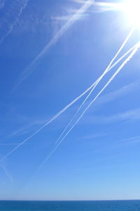 Vapor trails in sky