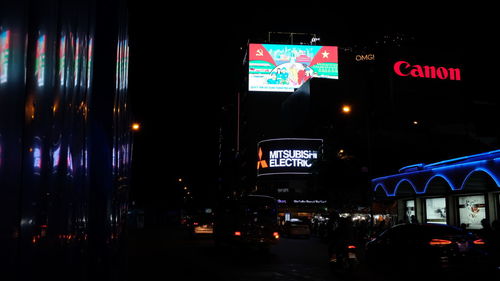 Traffic on road in city at night