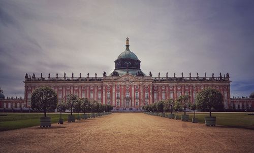 View of building against cloudy sky