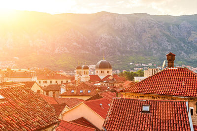 High angle view of townscape against mountain