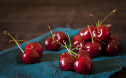 Close-up of cherries on table