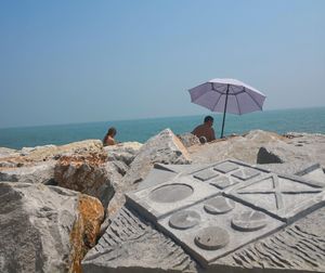 Scenic view of sea against clear sky