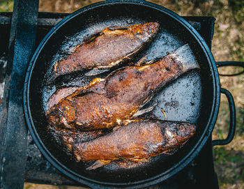 Close-up of meat in cooking pan