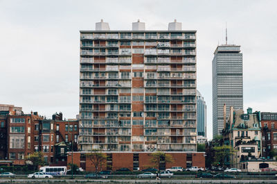 Buildings in city against sky