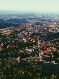 Aerial view of cityscape against sky