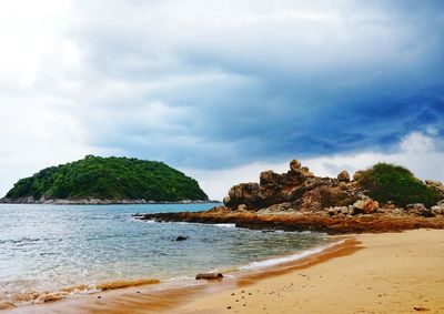 Scenic view of beach against sky