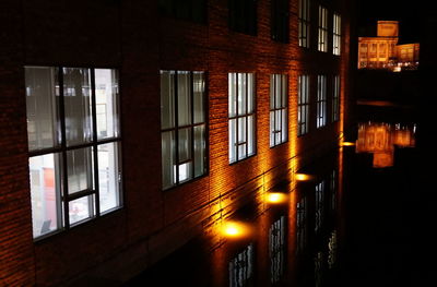 Full frame shot of illuminated building at sunset