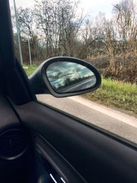 Cropped image of car on road