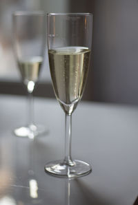 Close-up of wine glass on table