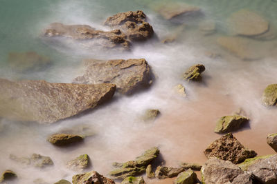 Scenic view of rocks in sea