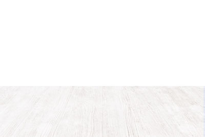 White wall with hardwood floor