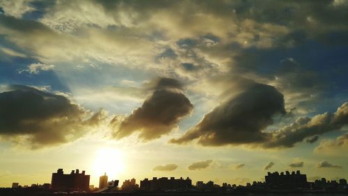 Silhouette of buildings at sunset