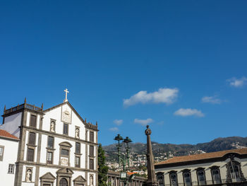 Low angle view of buildings against sky