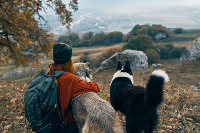 Rear view of man looking at mountains