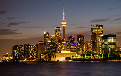 Illuminated buildings in city at night