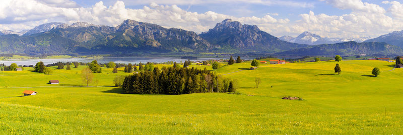 Panoramic landscape with alps mountains and lake