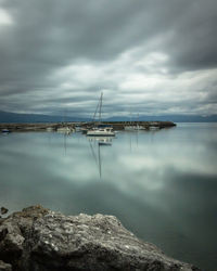 Scenic view of sea against cloudy sky