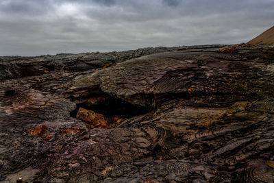 Scenic view of rock formations against sky