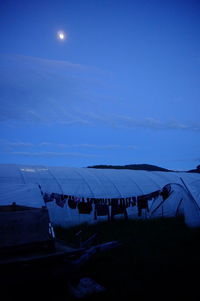 Scenic view of land against sky at night