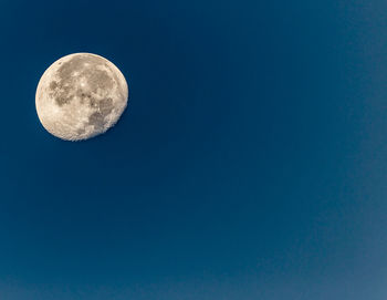 Low angle view of moon in sky