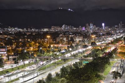 High angle view of illuminated buildings at night