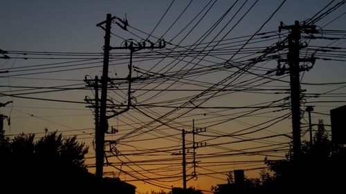 Low angle view of electricity pylon