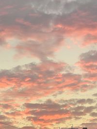 Low angle view of dramatic sky during sunset
