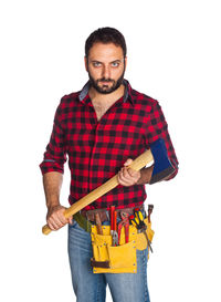 Portrait of man standing against white background