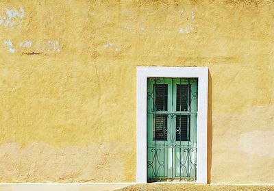 Closed door, green and yellow, mexico