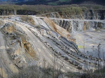 High angle view of road passing through land