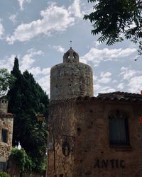 Low angle view of old building against sky