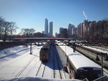 View of railroad tracks against sky during winter