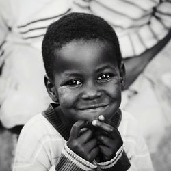 Close-up portrait of smiling boy