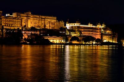 Illuminated buildings in city at night